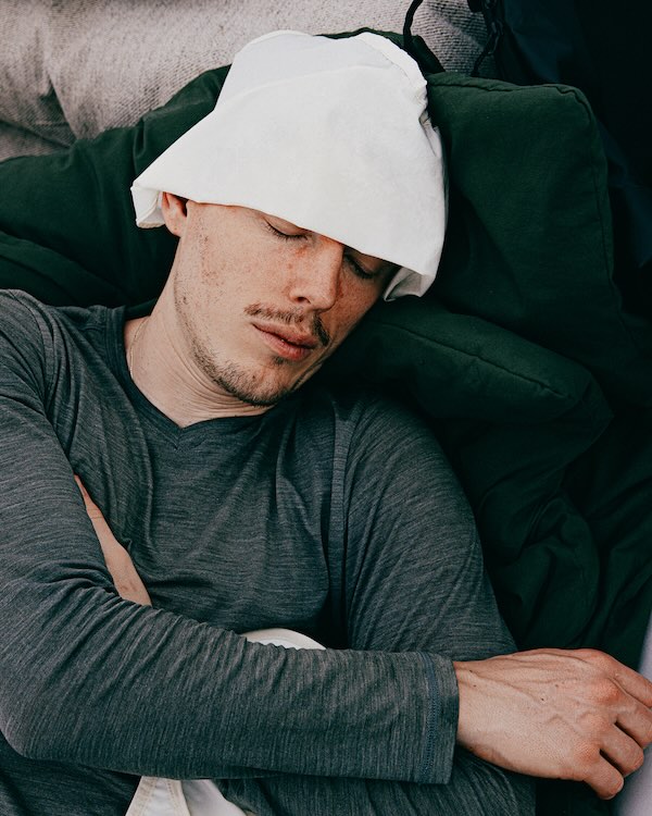 Crew member resting between loops at a backyard ultra
